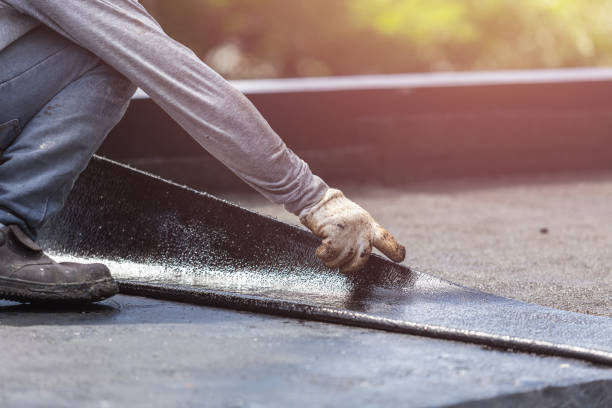Professional Basement Waterproofing technician working in Alton, IL